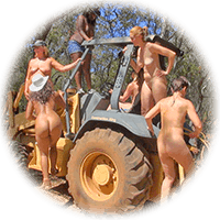naked group poses on a tractor